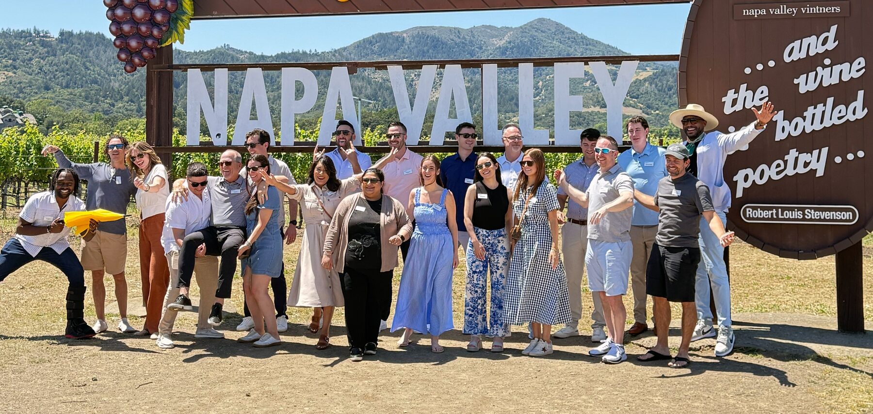 Corporate group toasting at a premium winery